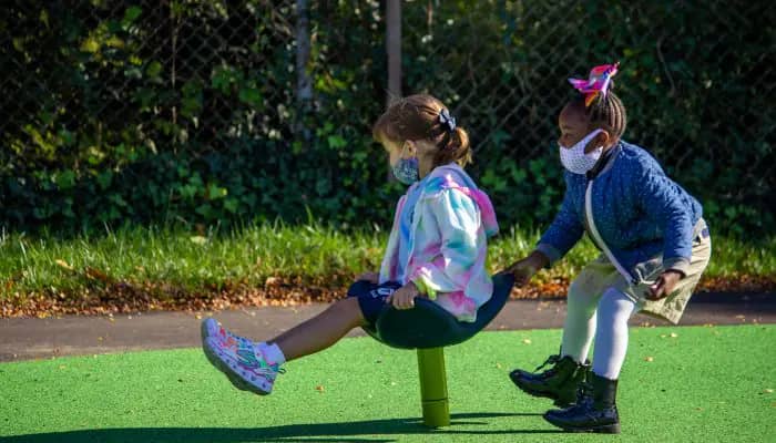 Children enjoying the renovated McCreesh Playground, which includes a new sprayground and playground.