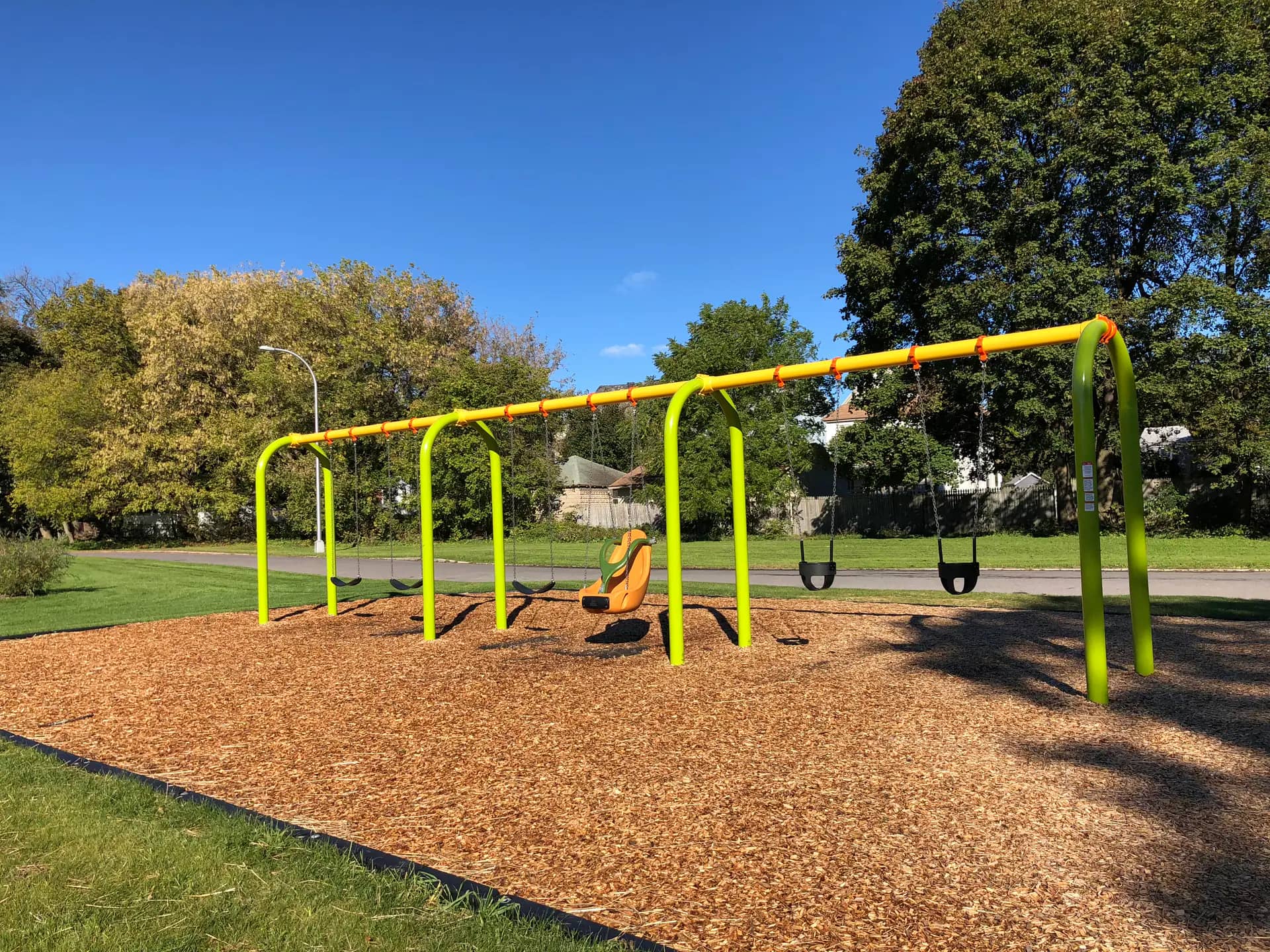 Swings and playground at Lower Onondaga Park.