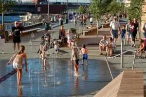 Children playing in the CityDeck splashpad in downtown Green Bay.